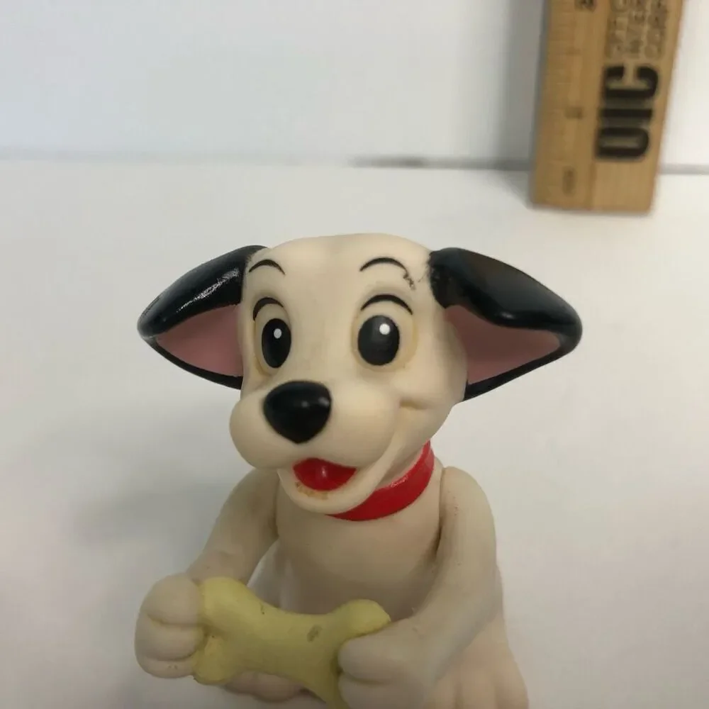 disney 101 dalmatians puppy dog rubber figure holding bone arms move up and down